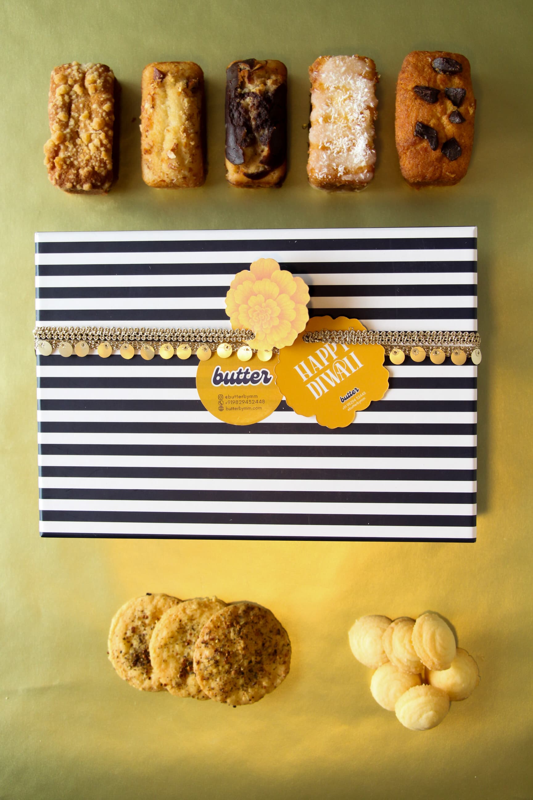 The Festive Spread with five mini loaf cakes, vanilla cookie drops and cheddar mixed herb bites