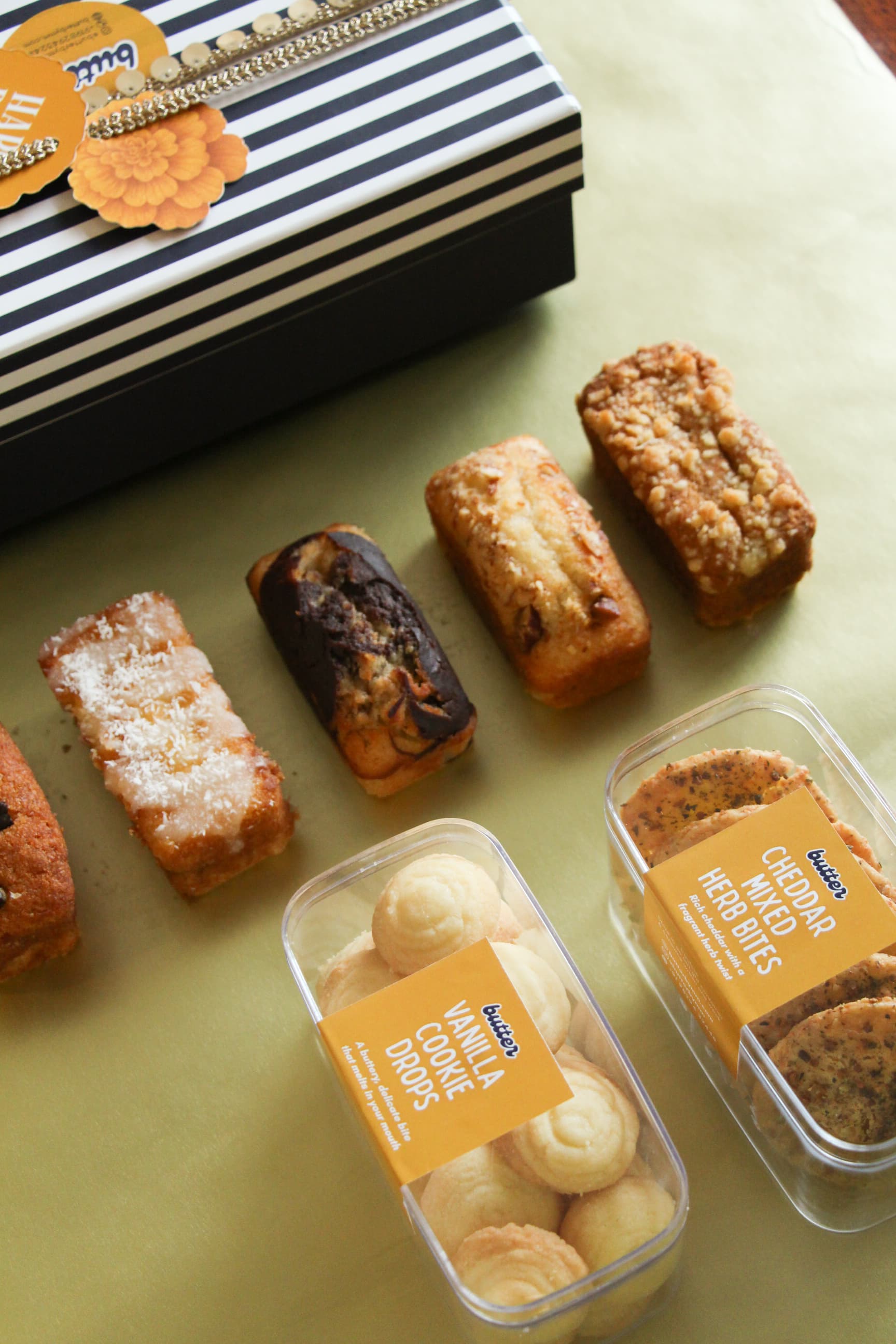 Vanilla cookie drops and cheddar mixed herb bites with mini loaf cakes